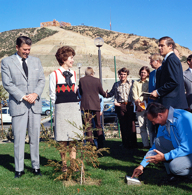 Nancy and Ronald Reagan planting a tree