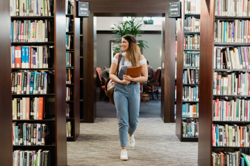 student walking through Payson