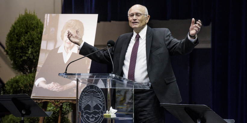 Jerry Rushford speaking at the Helen Young Memorial in Firestone Fieldhouse on January 5, 2018.