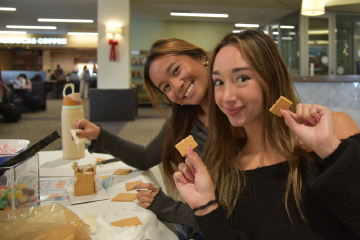 students making a gingerbread house