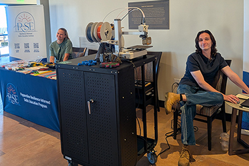 Librarian with makerspace cart