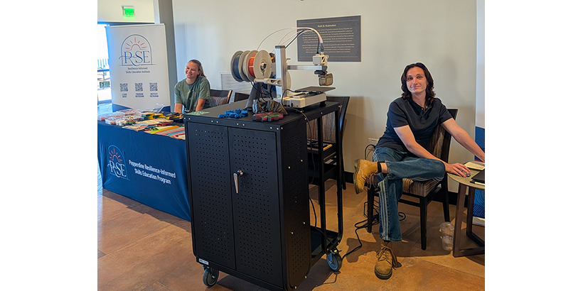 Librarian with makerspace cart